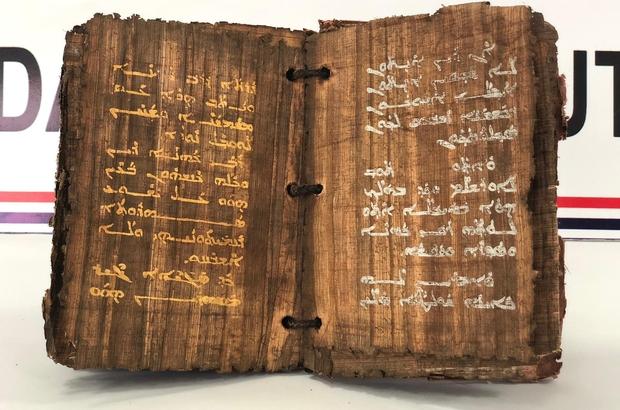 Diyarbakır'da 1300 yıllık altın yazmalı kitap ele geçirildi