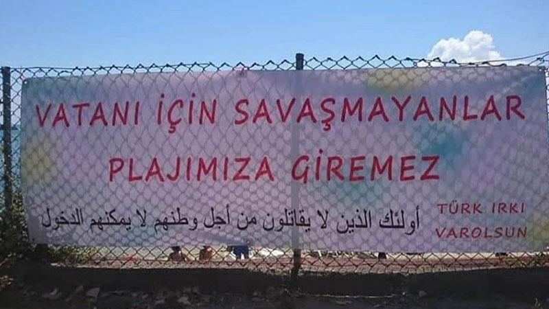 'Vatanı için savaşmayanlar plajımıza giremez' yazılı pankart kaldırıldı