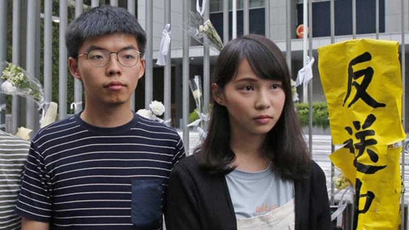 Hong Kong'daki protestoların önde gelen üç ismi gözaltına alındı