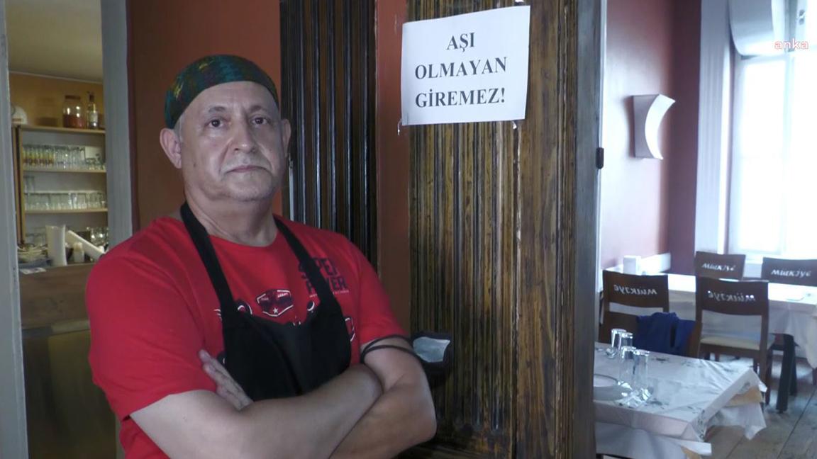 İzmir'de restoran işletmecisi, aşı karşıtlarına yönelik yazı astı: Aşı yaptırmayanı tespit edip, restorana almayacağız